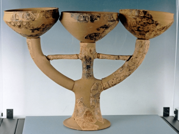 Three-armed vase with stamped decoration, from Ca' Morta end of 6th century BCE. Museum of Archaeology, Como.