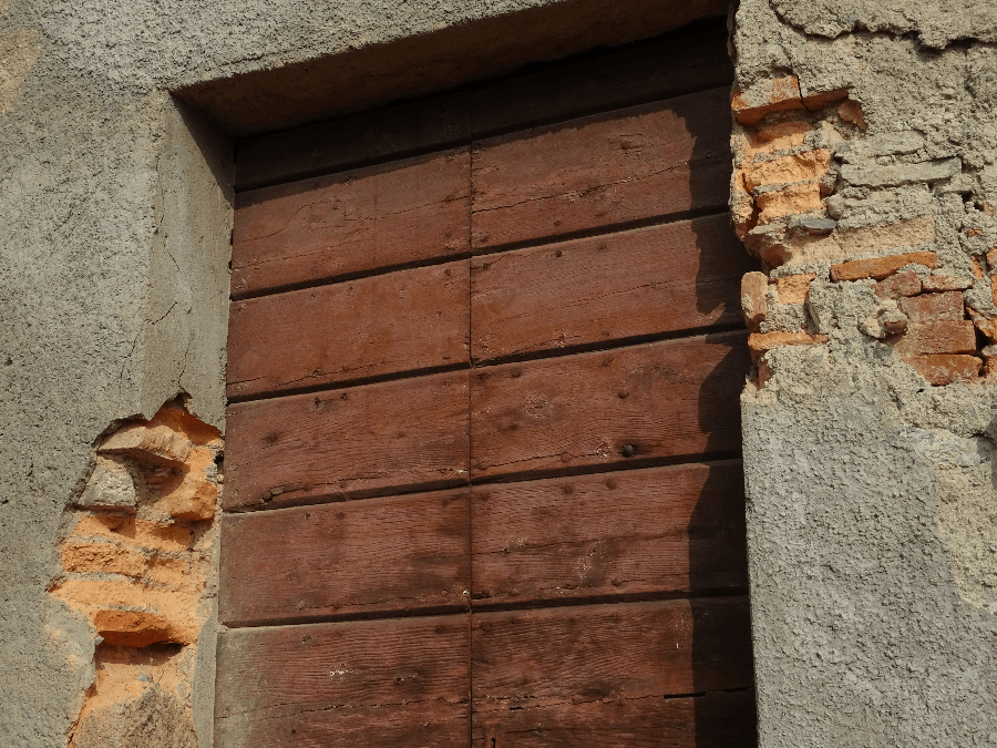 Doorway with brick and stucco